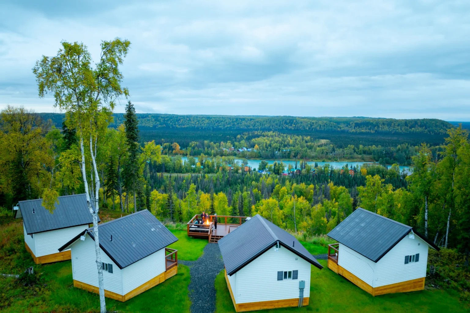 Aerial view of Wildflower Ridge cabins overlooking the Kenai River and Kenai Mountains